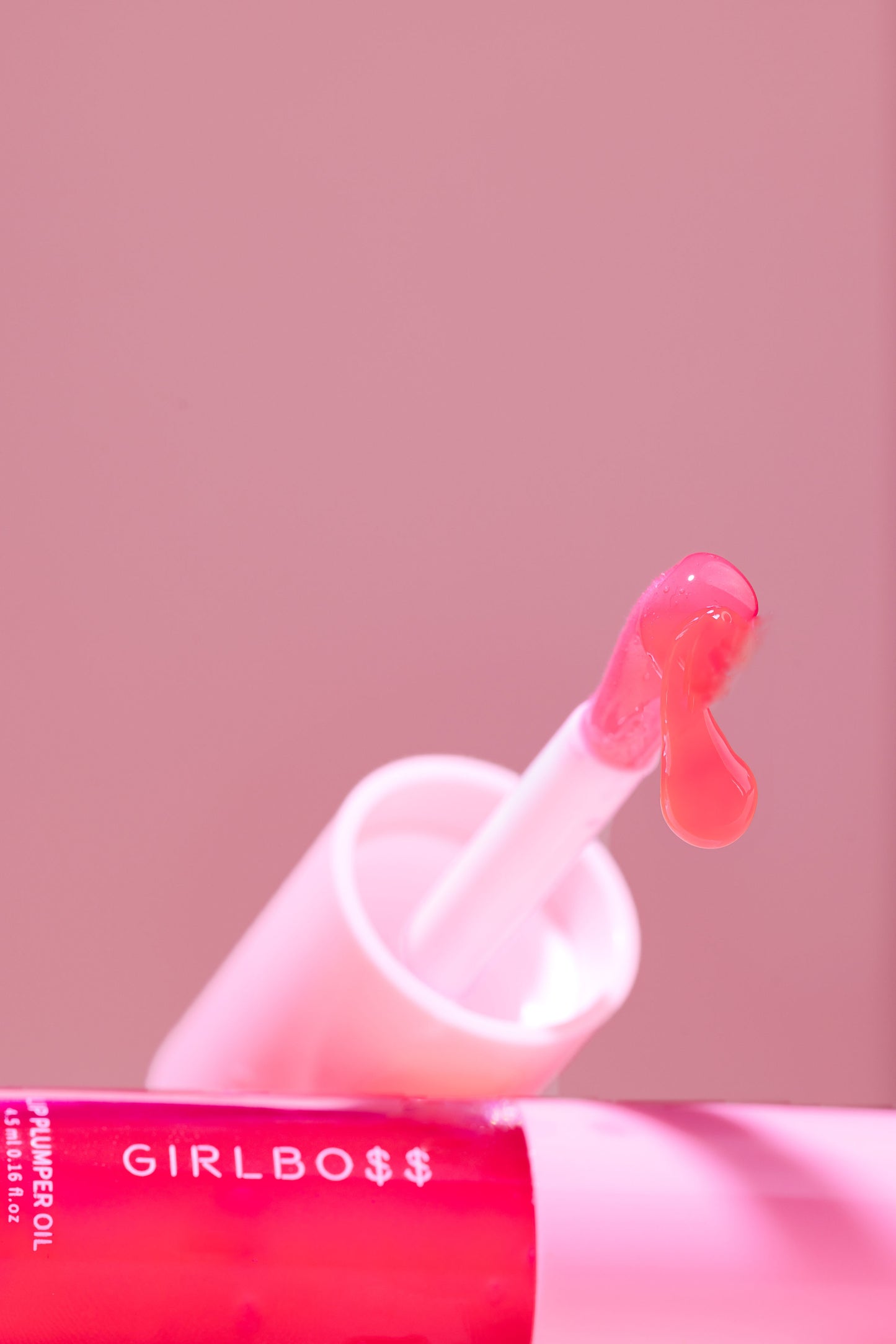 Girlboss lip plumber oil